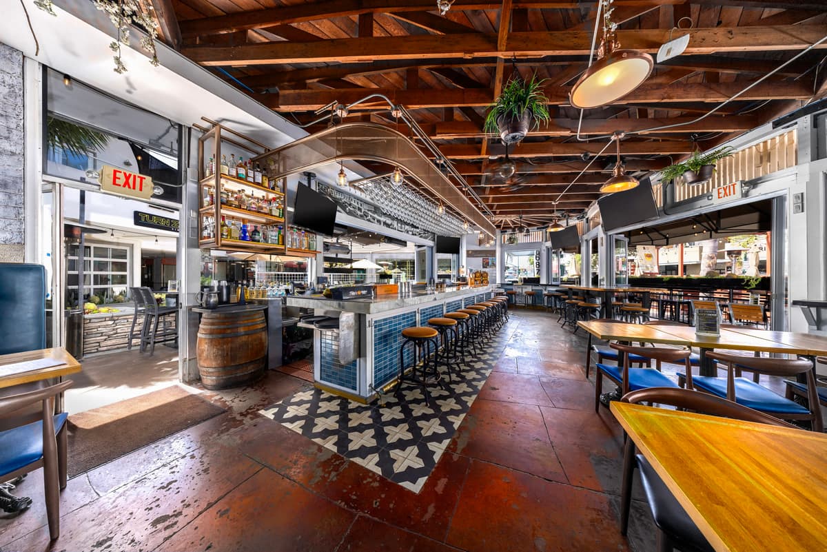 Communal tables and the central bar at Bier Garden Encinitas