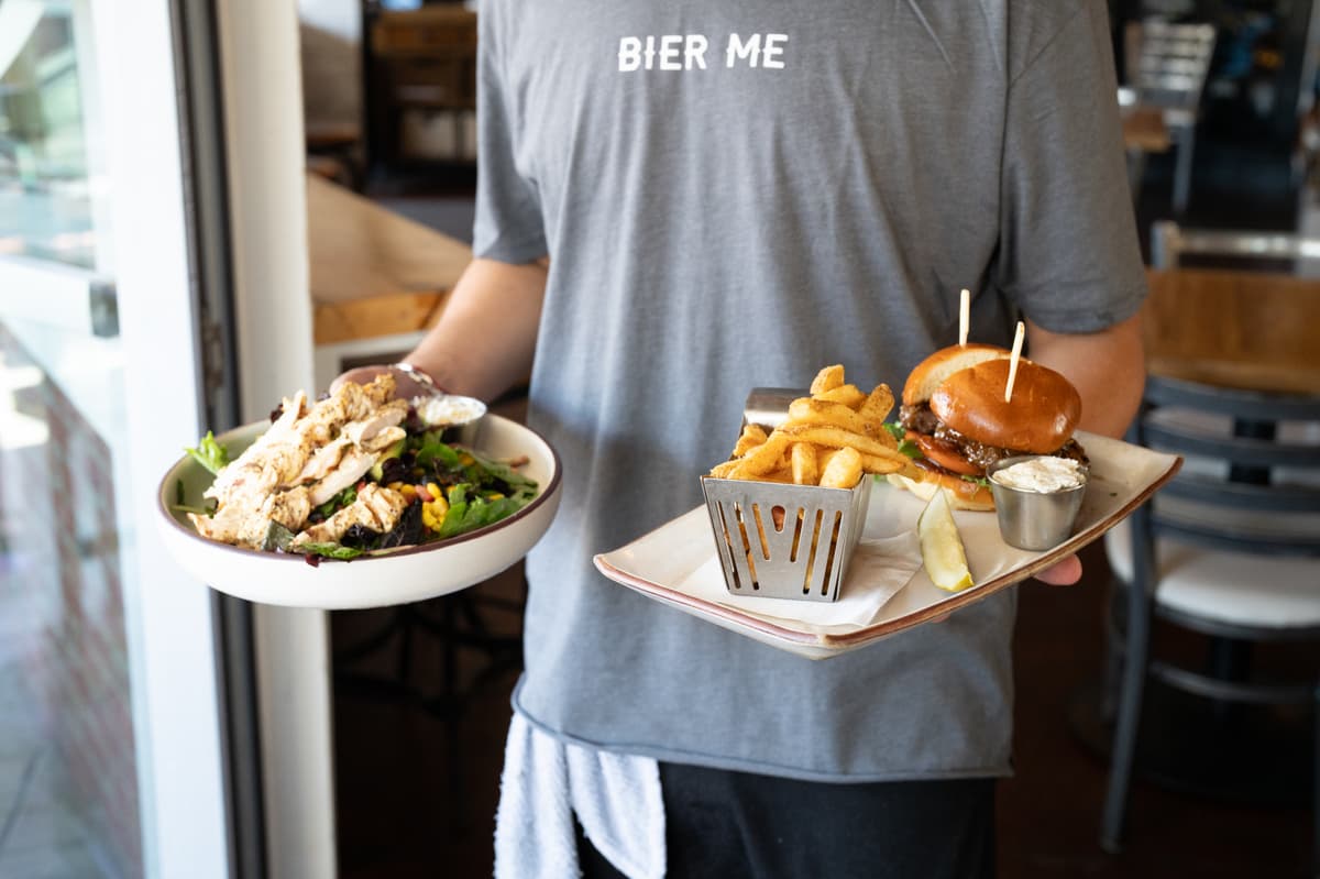 Loaded nachos and shareable plates at Bier Garden